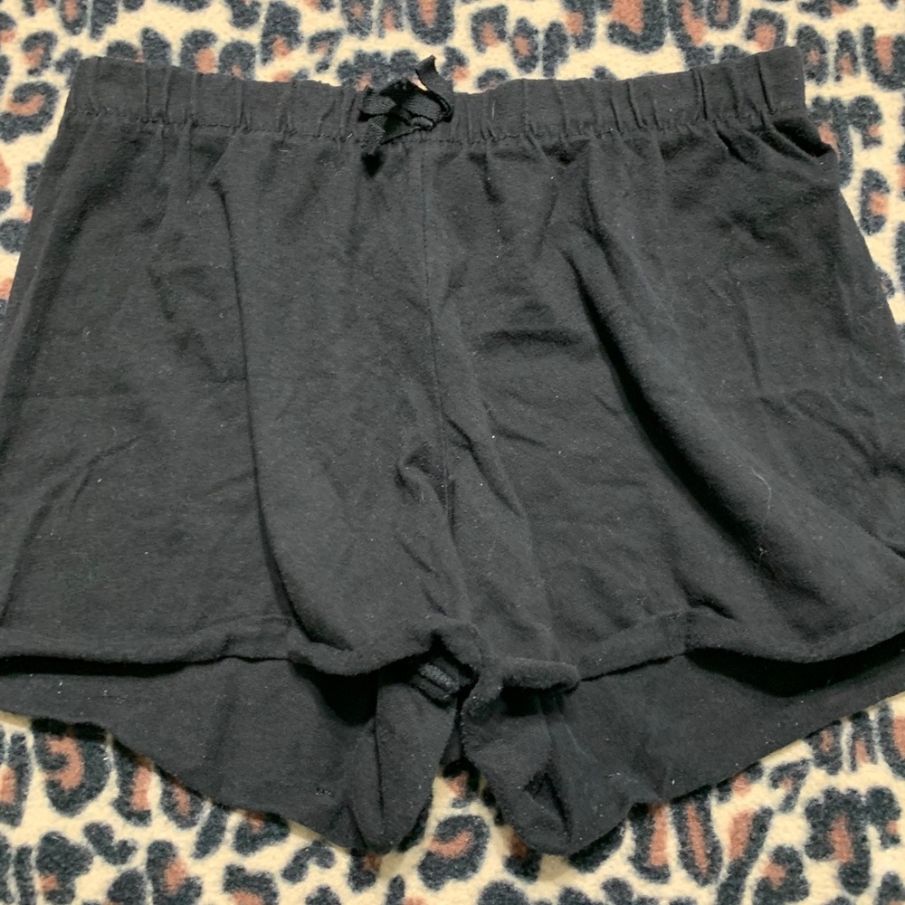 Black shorty shorts.